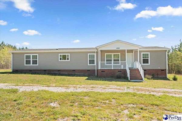 7.3 Acres of Land with Home for Sale in Bennettsville, South Carolina
