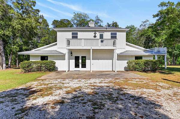 2.56 Acres of Land with Home for Sale in Magnolia Springs, Alabama