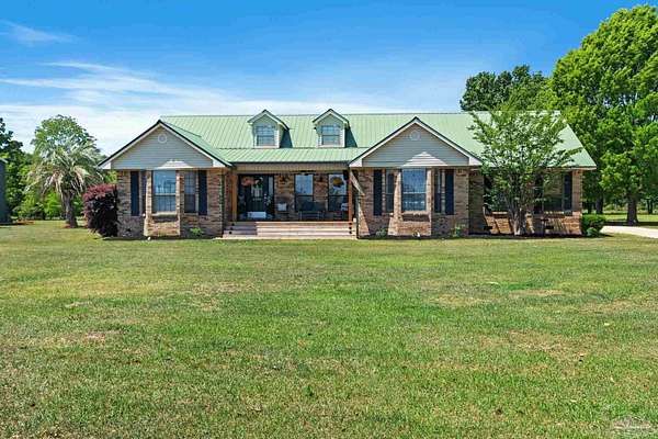 5.6 Acres of Land with Home for Sale in Frisco City, Alabama