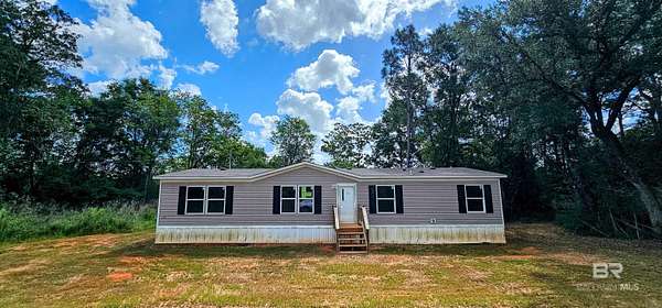 5.13 Acres of Land with Home for Sale in Robertsdale, Alabama