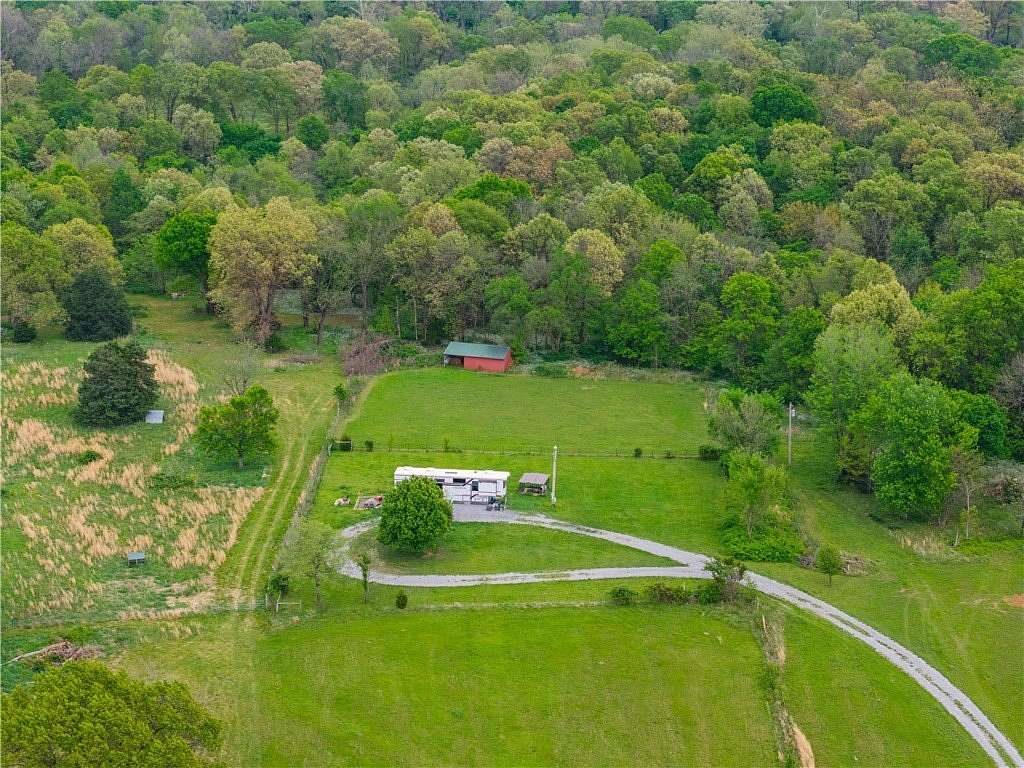 5 Acres of Residential Land for Sale in Gravette, Arkansas