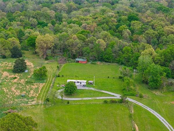 5 Acres of Residential Land for Sale in Gravette, Arkansas
