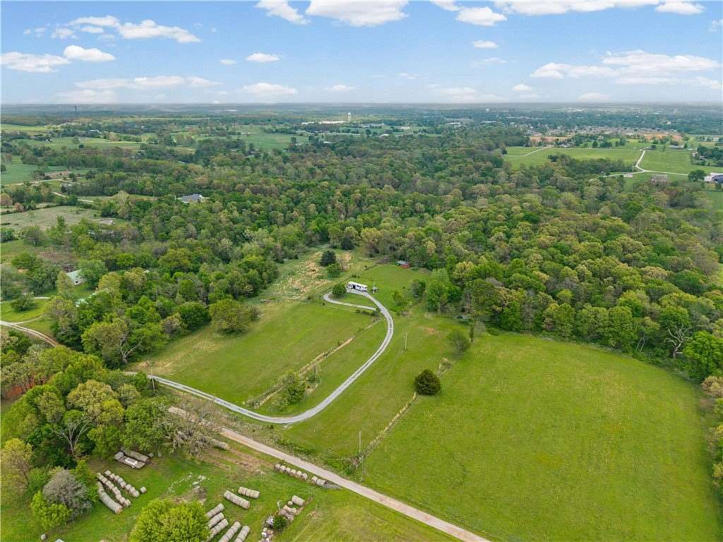5 Acres of Residential Land for Sale in Gravette, Arkansas
