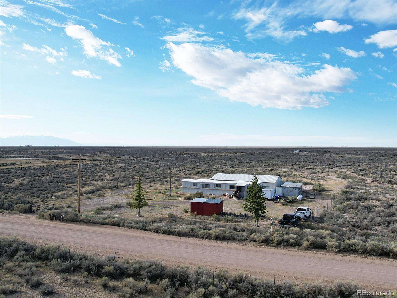 5 Acres of Land with Home for Sale in Saguache, Colorado