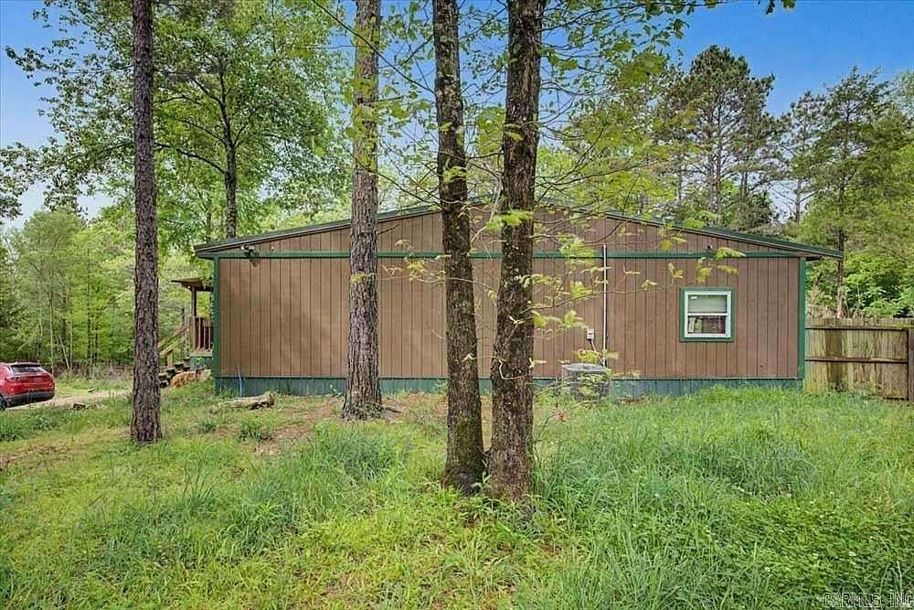 10.2 Acres of Land with Home for Sale in Amity, Arkansas