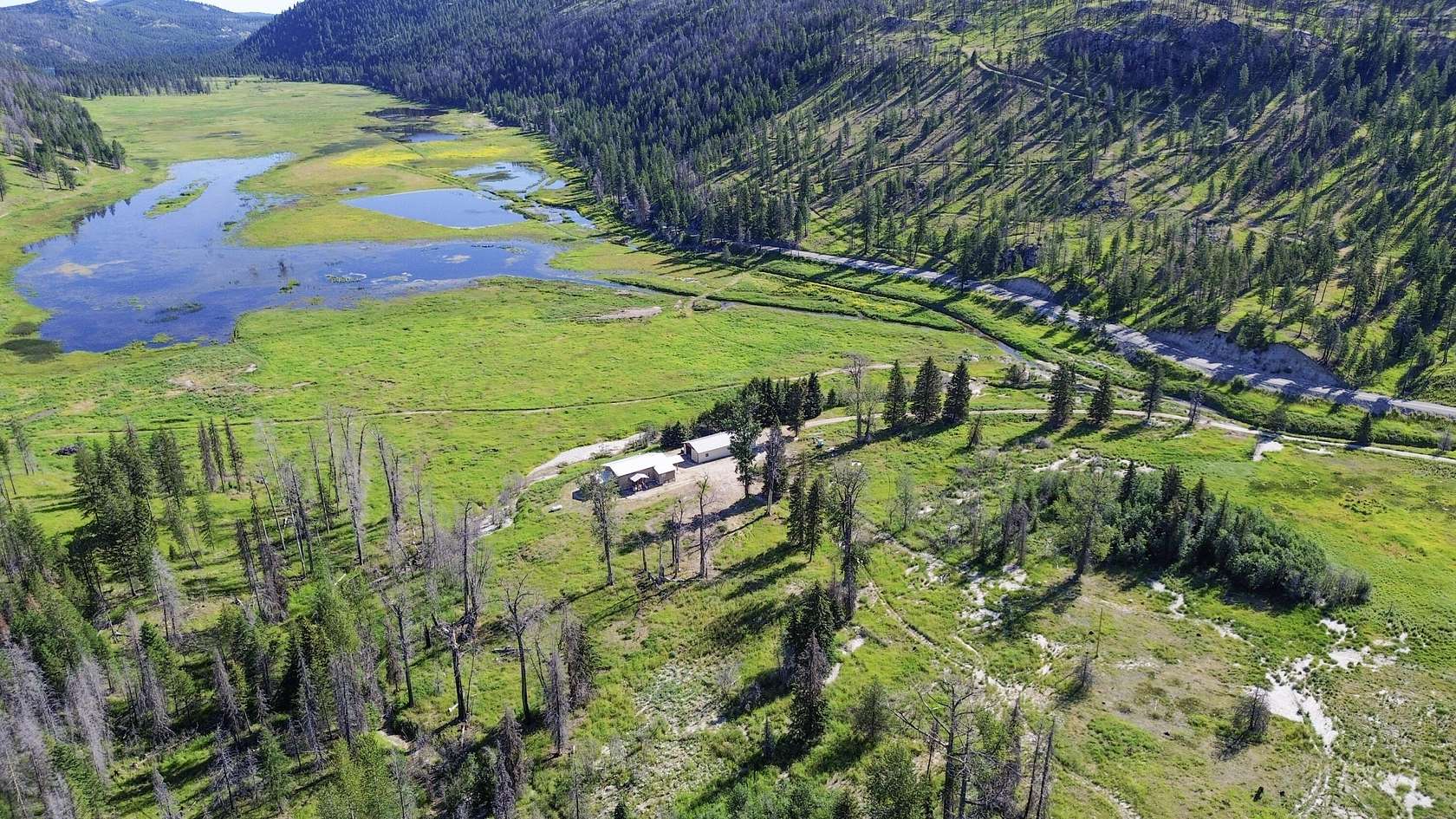27.7 Acres of Recreational Land with Home for Sale in Tonasket, Washington