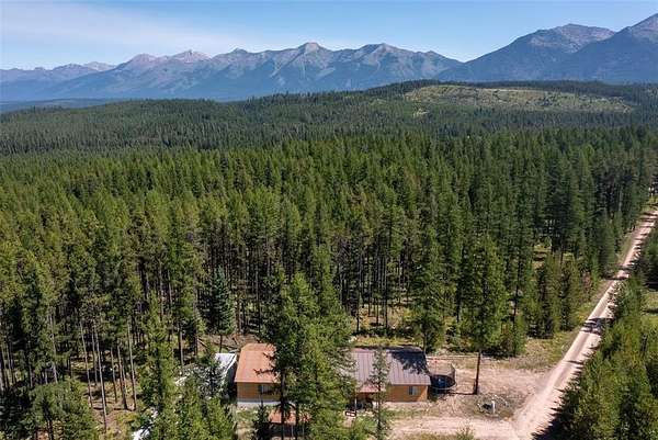 5.48 Acres of Land with Home for Sale in Seeley Lake, Montana