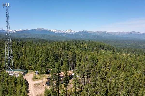 5.48 Acres of Land with Home for Sale in Seeley Lake, Montana