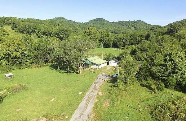 24.3 Acres of Agricultural Land with Home for Sale in Liberty, Tennessee