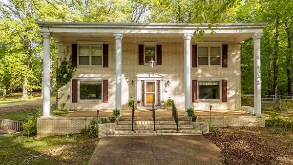 1.68 Acres of Land with Home for Sale in Selmer, Tennessee