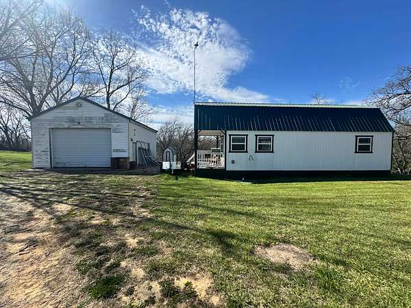 6.3 Acres of Land with Home for Sale in Dawn, Missouri
