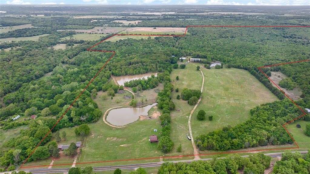 399 Acres of Land with Home for Sale in Arthur City, Texas
