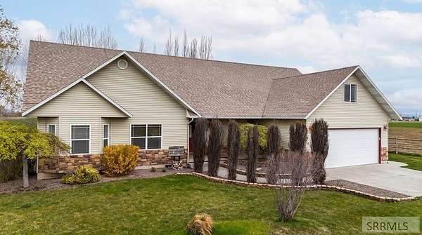 5.3 Acres of Land with Home for Sale in Sugar City, Idaho