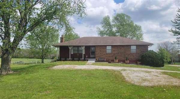 5 Acres of Land with Home for Sale in Belton, Missouri