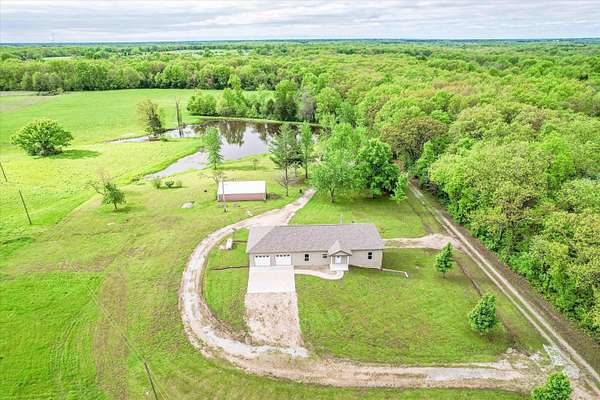 20 Acres of Recreational Land with Home for Sale in Auxvasse, Missouri