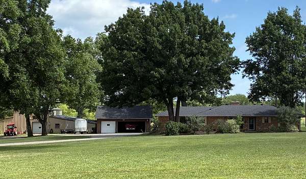 8.4 Acres of Land with Home for Sale in Denison, Texas