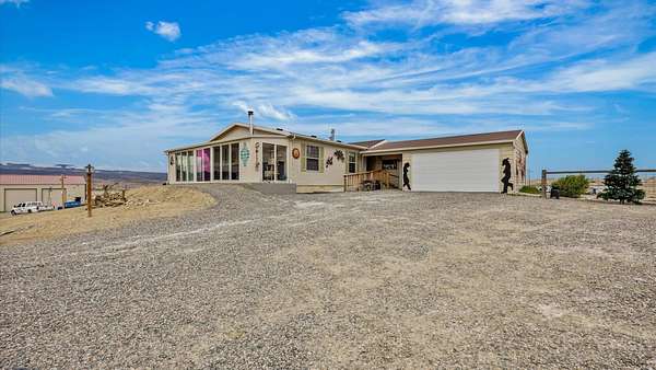 9.43 Acres of Land with Home for Sale in Whitewater, Colorado