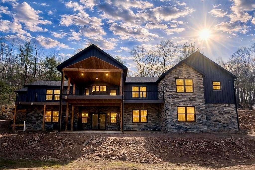 10.8 Acres of Land with Home for Sale in James Creek, Pennsylvania