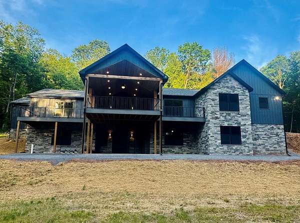 10.8 Acres of Land with Home for Sale in James Creek, Pennsylvania
