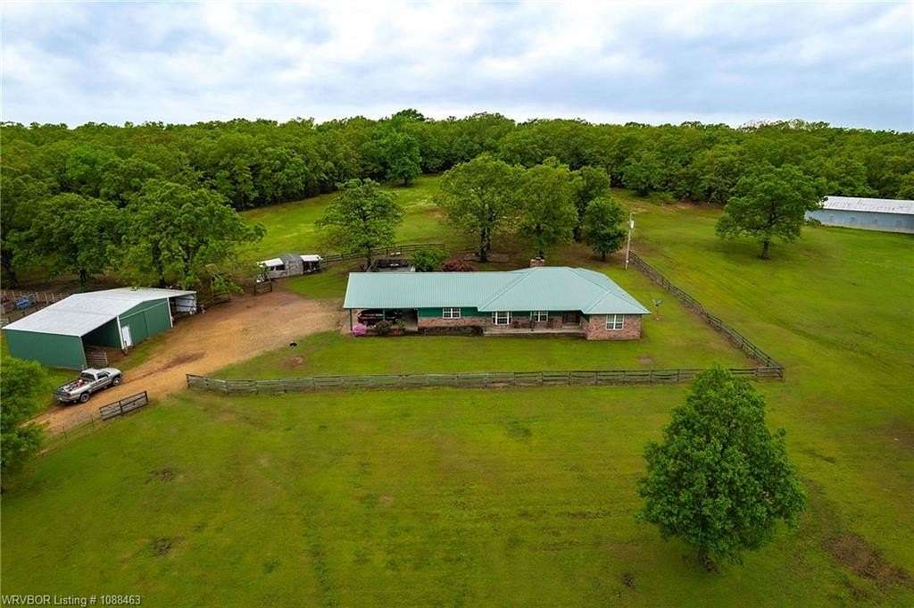 20 Acres of Agricultural Land with Home for Sale in Sallisaw, Oklahoma