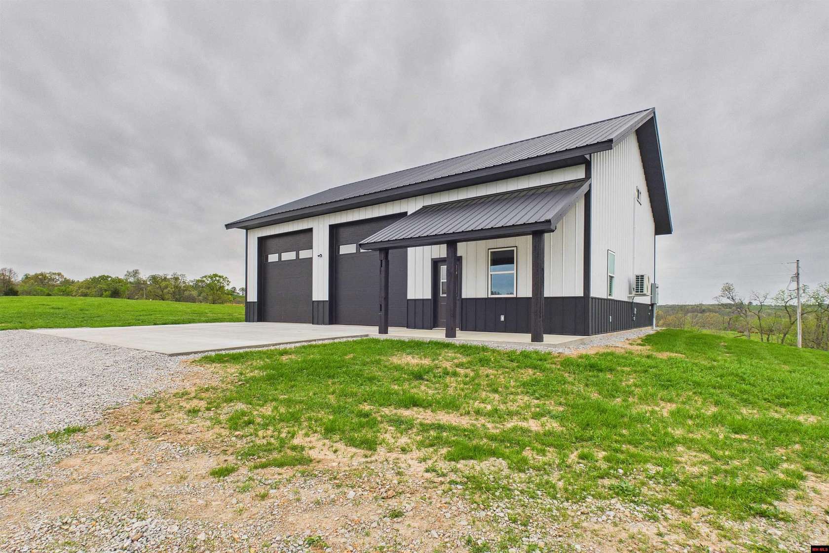 105 Acres of Agricultural Land with Home for Sale in Wasola, Missouri