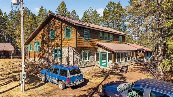 20 Acres of Recreational Land with Home for Sale in Spalding Township, Minnesota