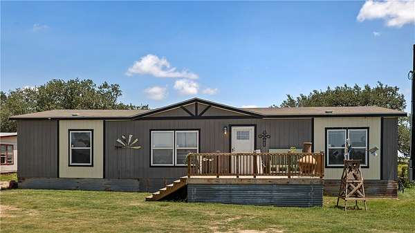 16 Acres of Land with Home for Sale in Poteet, Texas