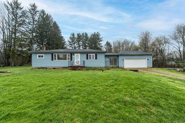 2.5 Acres of Land with Home for Sale in Bellevue, Michigan