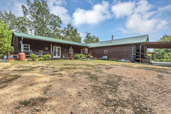 15.2 Acres of Land with Home for Sale in Linden, Tennessee