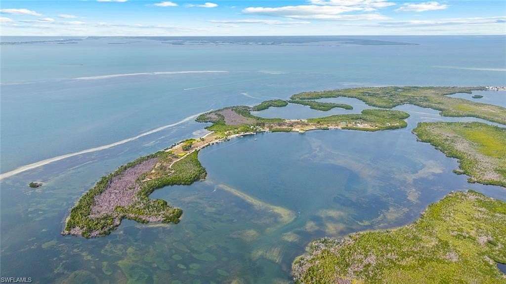 104 Acres of Land with Home for Sale in Bokeelia, Florida