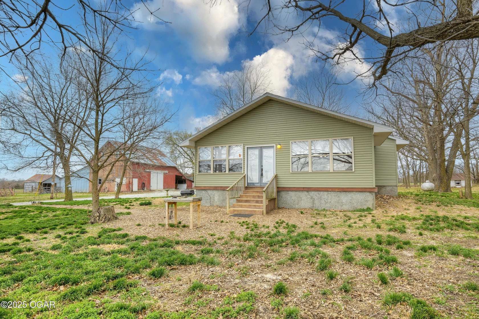 10 Acres of Land with Home for Sale in Carthage, Missouri