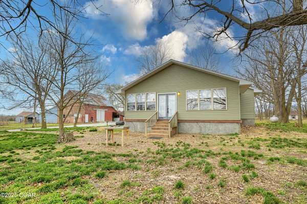 10 Acres of Land with Home for Sale in Carthage, Missouri