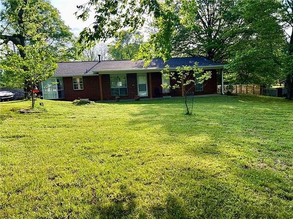 1.5 Acres of Land with Home for Sale in Fayetteville, Arkansas