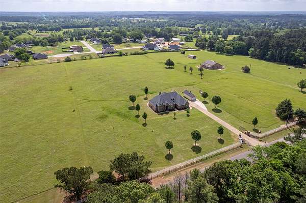 6.45 Acres of Land with Home for Sale in Flint, Texas