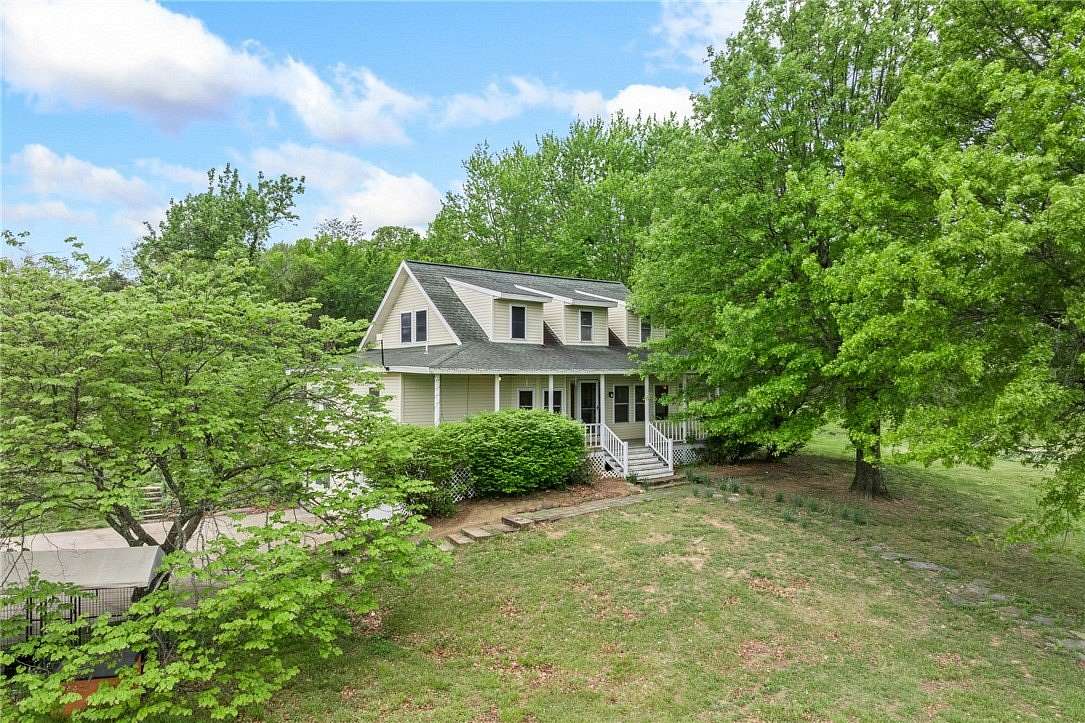 4.7 Acres of Land with Home for Sale in Harrison, Arkansas