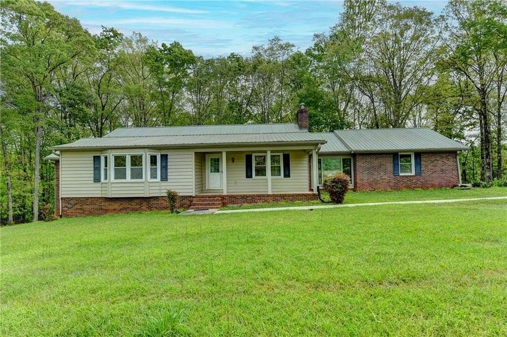 23.5 Acres of Agricultural Land with Home for Sale in Auburn, Georgia