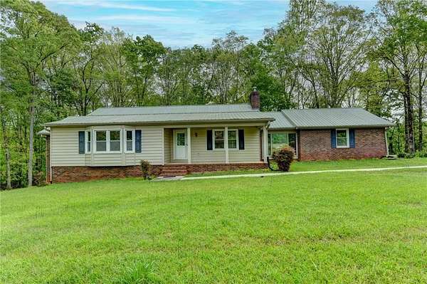 23.5 Acres of Agricultural Land with Home for Sale in Auburn, Georgia