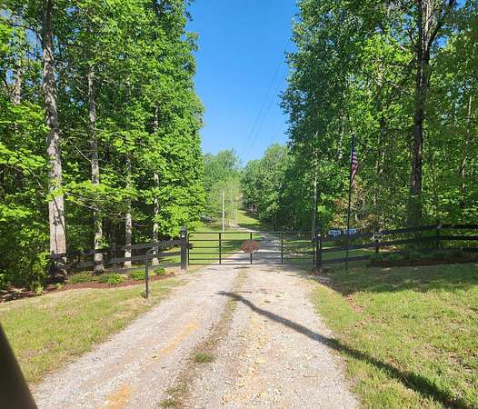 94.5 Acres of Recreational Land with Home for Sale in Summertown, Tennessee