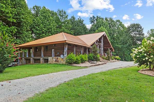 94.5 Acres of Recreational Land with Home for Sale in Summertown, Tennessee