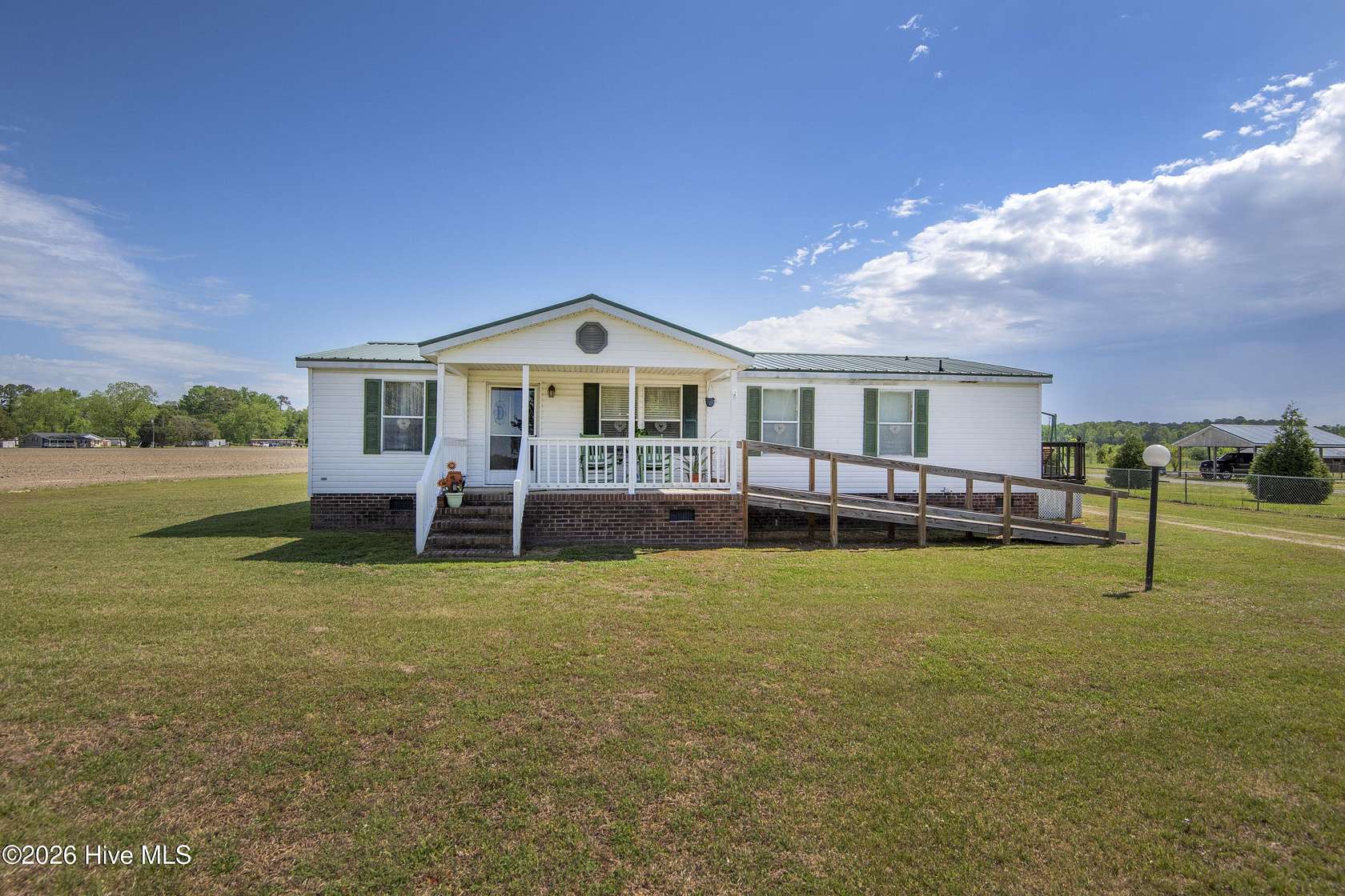 2.62 Acres of Land with Home for Sale in Whitakers, North Carolina