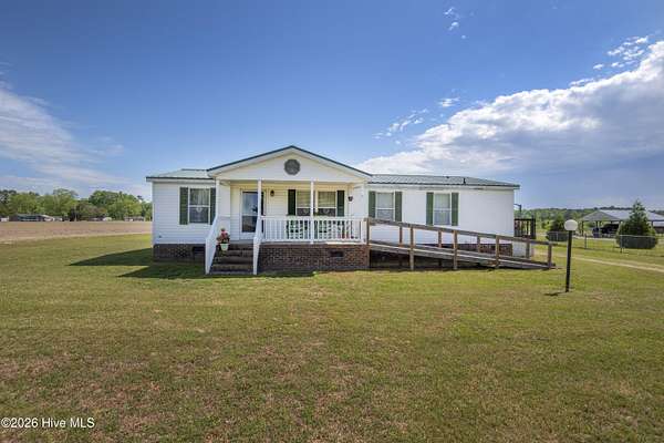 2.62 Acres of Land with Home for Sale in Whitakers, North Carolina