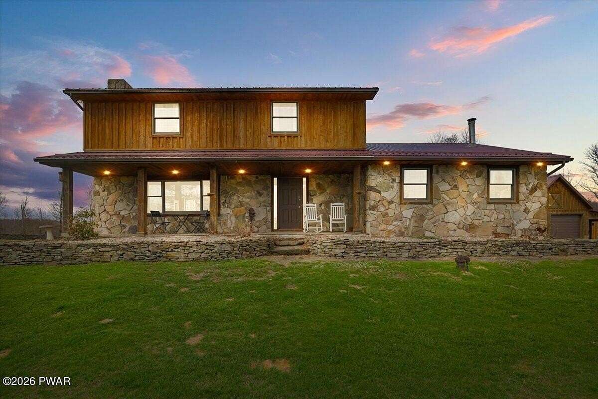 10 Acres of Land with Home for Sale in Forest City, Pennsylvania