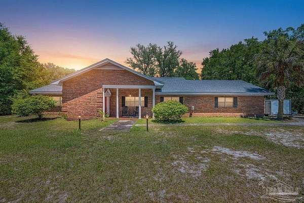 2.89 Acres of Land with Home for Sale in Milton, Florida
