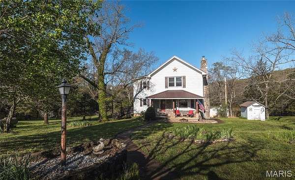 23 Acres of Land with Home for Sale in Richland, Missouri