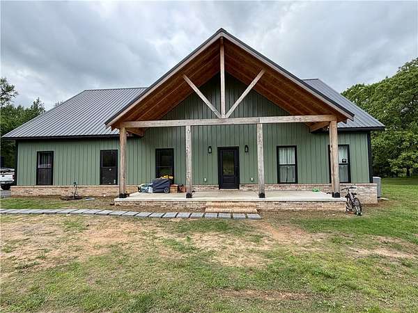 12.6 Acres of Land with Home for Sale in Plainview, Arkansas