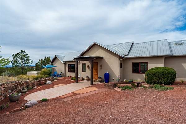 3 Acres of Land with Home for Sale in Lamy, New Mexico