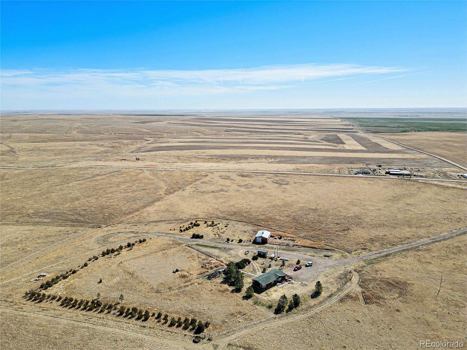 320 Acres of Agricultural Land with Home for Sale in Fort Morgan, Colorado