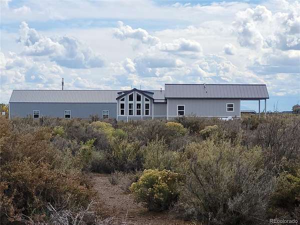 4.9 Acres of Land with Home for Sale in Alamosa, Colorado