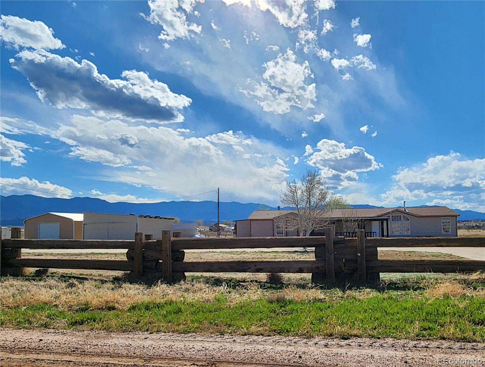 5 Acres of Land with Home for Sale in Florence, Colorado