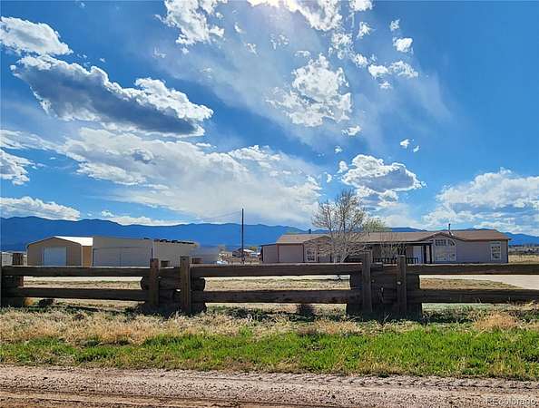 5 Acres of Land with Home for Sale in Florence, Colorado